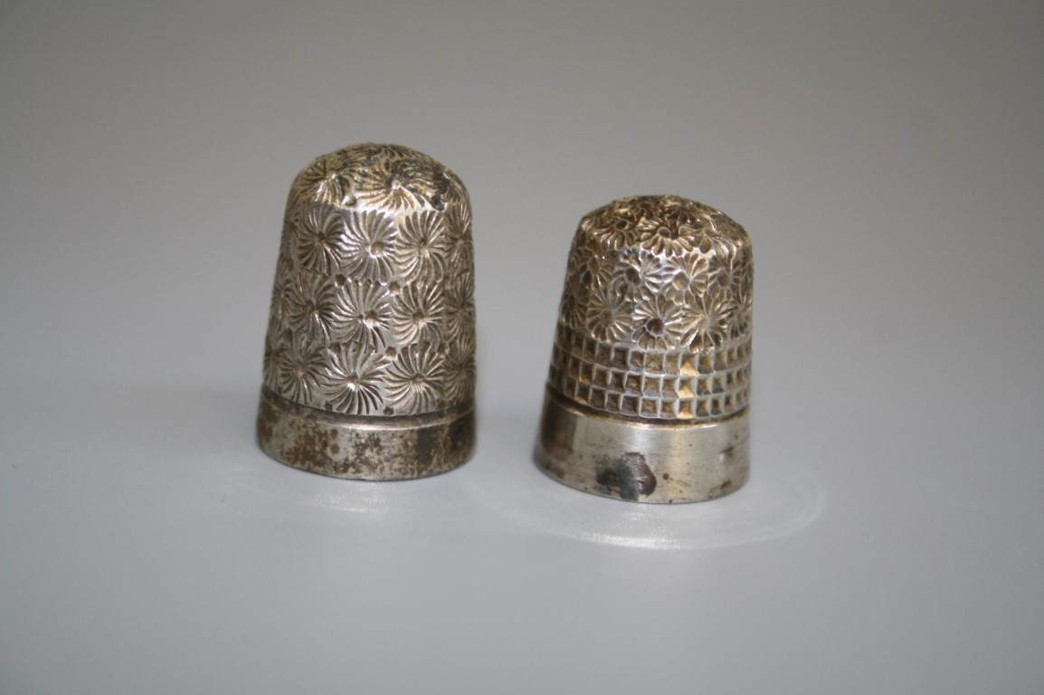 Two silver thimbles, Chester 1902 and Birmingham 1924