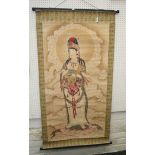 A Chinese 20th century painted scroll, depicting Guan Yin on a lotus socle with silk brocade border,