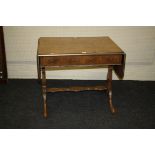 A Maple and Co of London burr walnut sofa table with gilt decoration, 86cm long