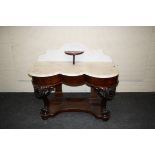 A Victorian marble topped mahogany Duchess dressing table,125cm wide