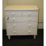 A Victorian painted pine chest of drawers with turned supports, 96cm wide