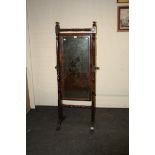 A George IV mahogany cheval mirror, 48cm with turned frame