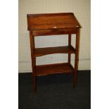 An early 20th century stripped pine clerk's desk, with hinged lid, 81cm wide