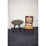 A wrought iron and split cane vintage bistro chair, together with a bobbin turned 'Gypsy' type