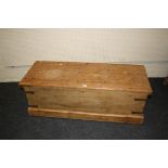 A 19th century stripped timber sea chest with rope handle, 133cm wide