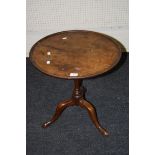 A part George III mahogany low tripod table with circular dished top, 52cm