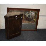 A small 19th century elm single door hanging corner cupboard, together with a mahogany framed