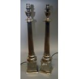 A pair of large silver plated Doric column table lamps, with square shades, 62cm high