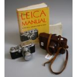 A Leica III C Range finder camera and original case, together with a hardback manual