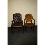 A deep buttoned leather upholstered Gainsborough armchair and one other chair