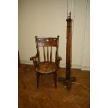 A Hereford type spindle back armchair and mahogany standard lamp