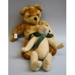 A large mid 20th century Pedigree blonde mohair teddy bear, jointed body with amber eyes, stitched