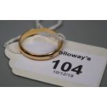 An 18ct gold pain 18ct gold wedding band, Ring size S, 3.4g