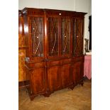 A reproduction mahogany astragal glazed break front bookcase,151.5cm wide
