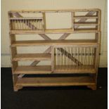 A painted rustic plate rack, 121cm wide