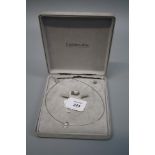 A diamond and pearl necklace and ring en suite, the necklace with single stone cultured pearl and