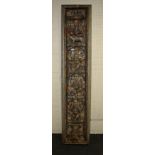 An Indian carved and painted architectural panel with Ganesh and Brahmin bull motif, 193cm high