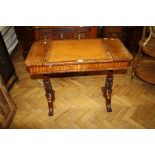 A Victorian carved mahogany lady's writing desk with ratcheted inclining top, 92cm wide