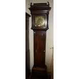An 18th century oak cased eight day longcase clock, the brass dial marked for Woolley of Kington,