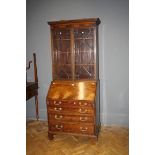 An Edwardian mahogany astragal glazed bureau bookcase, 84cm wide