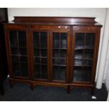 An Edwardian mahogany breakfront china cabinet with moulded edge, 150cm long