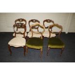 A harlequin set of seven Victorian walnut spoon back dining chairs, each with overstuffed seat