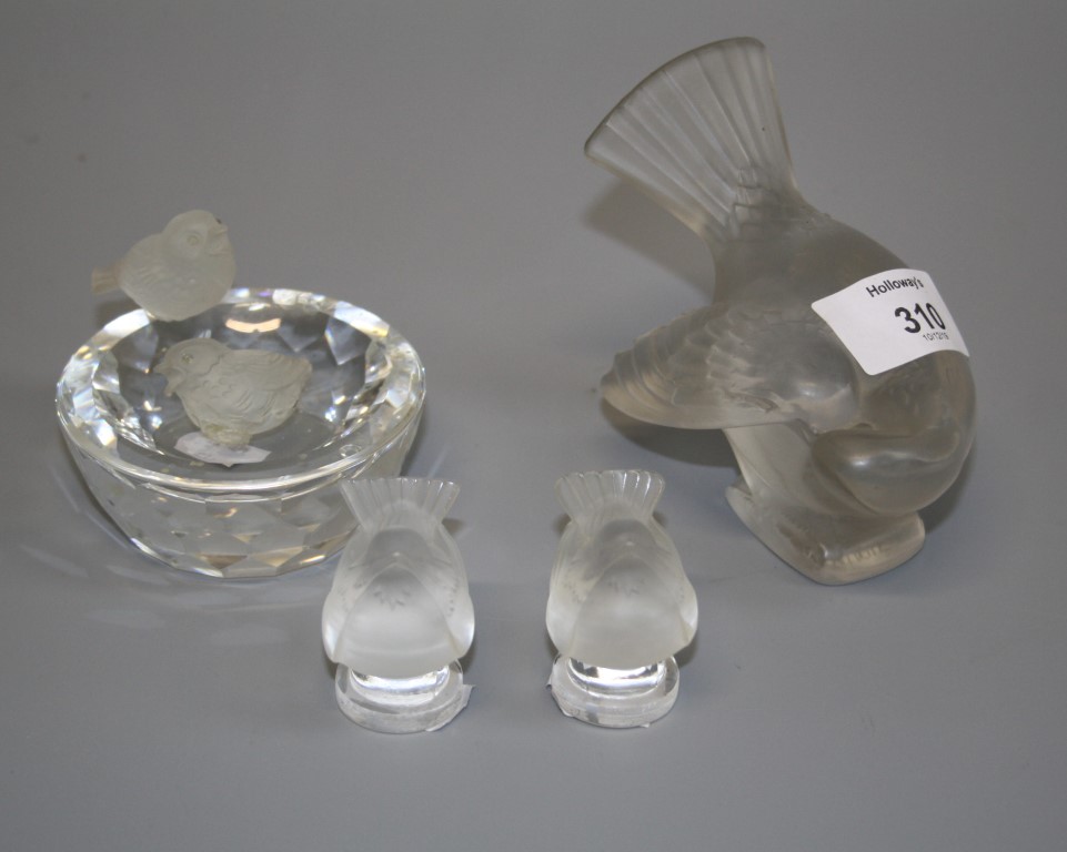 A Lalique sparrow paperweight and one similar, together with a large preening sparrow figure and a