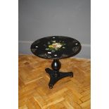 A Victorian snap top circular papier mache table with floral painted top, 81cm diameter