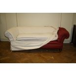 A Victorian three seat 'Chesterfield' settee with bun feet, 220cm wide