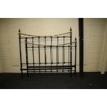 A Victorian style black iron and brass bedstead, with decorative finials, 150cm wide