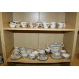 A collection of early 19th century mostly New Hall porcelain, tea bowls and saucers, together with a