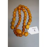 A single row amber bead necklace, the graduated butterscotch amber beads of oval shape, approx 71.2g