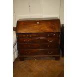 A George III mahogany full front writing bureau with fitted interior, 106cm wide