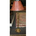 A lacquered brass telescopic stand lamp, with moulded base, 122cm closed, together with a Heart