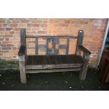 A rustic two seater bench, made from reclaimed structural timber, 143cm wide