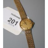 Omega, a lady's 9ct gold Omega wristwatch, circular champagne dial, baton numerals, and integral 9ct