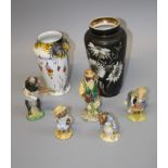 A collection of Beswickware and other ceramic figures, including 'Daniel', 'Tom Kitten', 'Otter