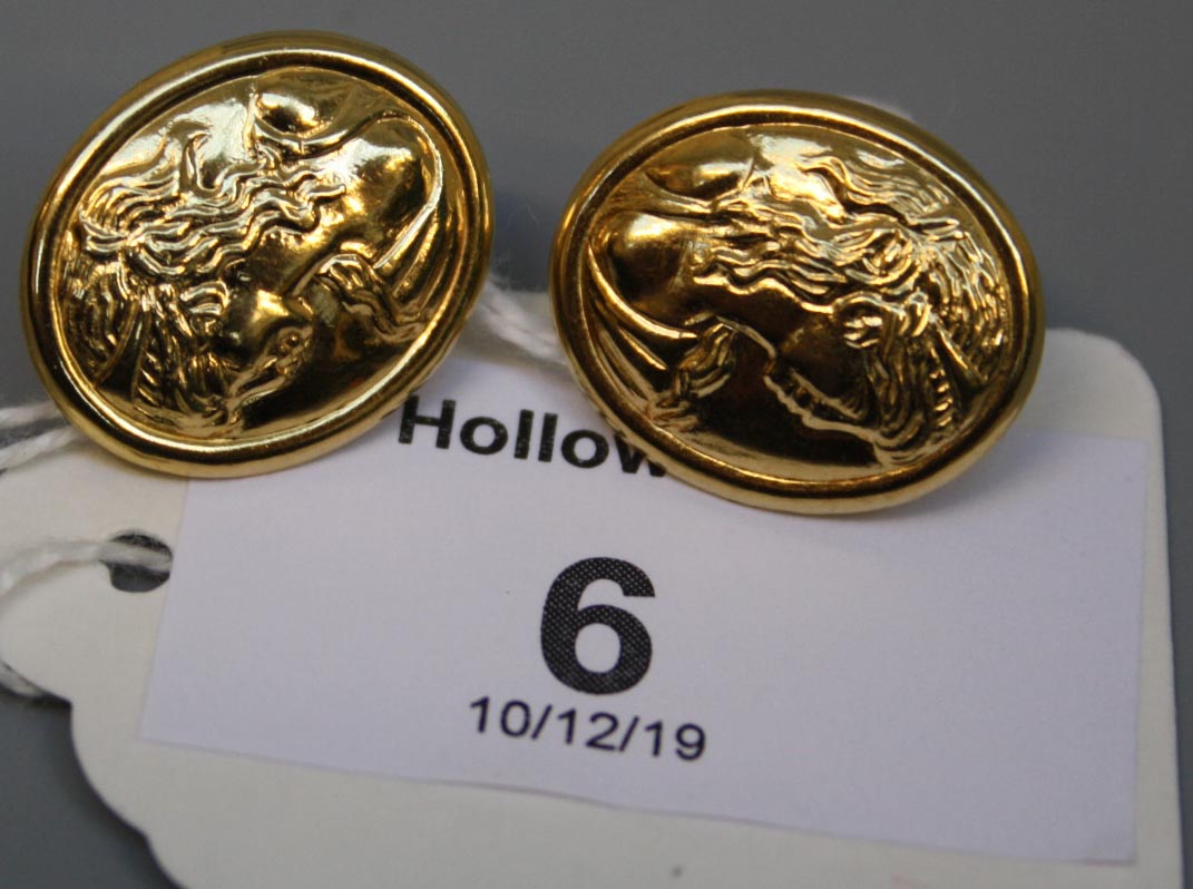 A pair of 18ct gold earrings, depicting a classical Egyptian female bust figure 3.4g