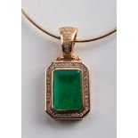 A substantial emerald and diamond pendant, the step cut, cut, cornered emerald in rub over mount,