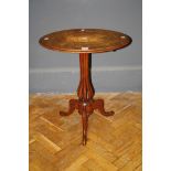 A Victorian walnut and marquetry oval top table with open work column and tripod base, 61cm wide