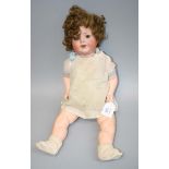 An early 20th century Armand Marseille 996 porcelain headed doll, with sleeping eyes and open mouth,