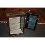 A mahogany framed counter top display cabinet, together with a wall mounted wall cupboard
