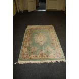 A Chinese jade green ground rug, in the Savonnerie style, 185 x 125cm