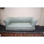 An Edwardian three seat drop arm 'Chesterfield' type sofa, with celadon green upholstery, 200cm