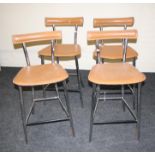 A set of four Arrben of Italy designer chrome and tan hide high stools