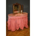 A vintage upholstered kidney shaped dressing table, 107cm