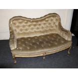 A Victorian carved wood and gilt gesso button back upholstered two seat sofa, 130cm wide
