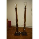 A pair of mahogany (bed post) standard lamps on stepped plinth base, 145cm high