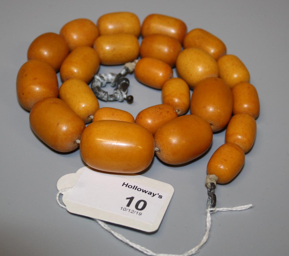 A single row amber bead necklace of graduated beads, 53.5cm, 94.2 gross weight Holloway's do not