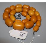 A single row amber bead necklace of graduated beads, 53.5cm, 94.2 gross weight Holloway's do not